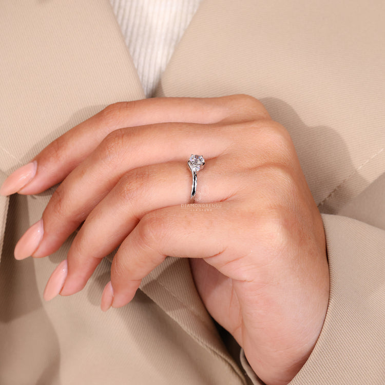 Timeless three stone white gold ring perfect for engagements.