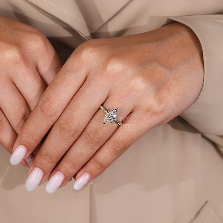 Simple diamond ring with a yellow gold band, perfect for everyday wear or as a timeless engagement ring.