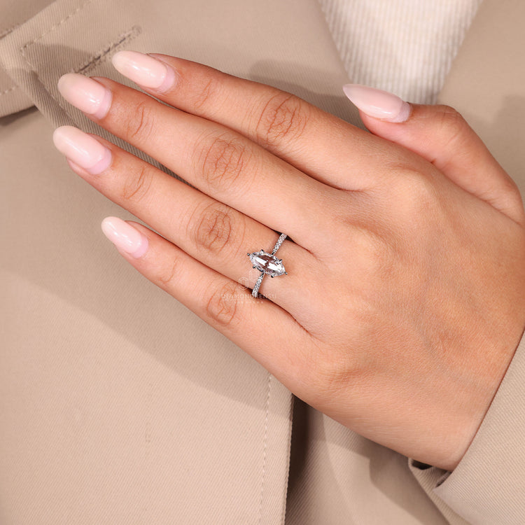 Pave setting ring with round cut diamonds in white gold.