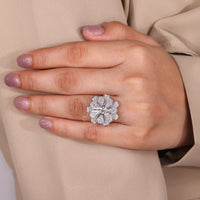 Vintage diamond ring showcasing round diamonds and handmade craftsmanship.