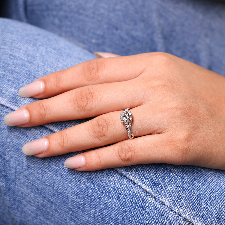 Twisted pave engagement ring in handmade jewelry design.