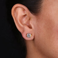 Radiant screw back diamond earrings for a luxurious look.