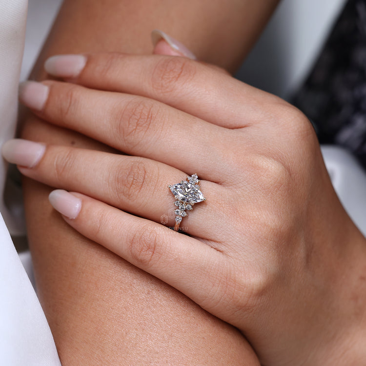 Six prong setting marquise center diamond ring