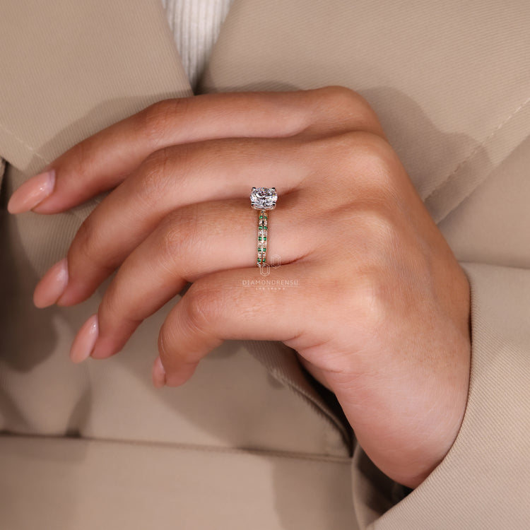 Four Prong Ring Setting holding a green diamond in a two-tone diamond ring.