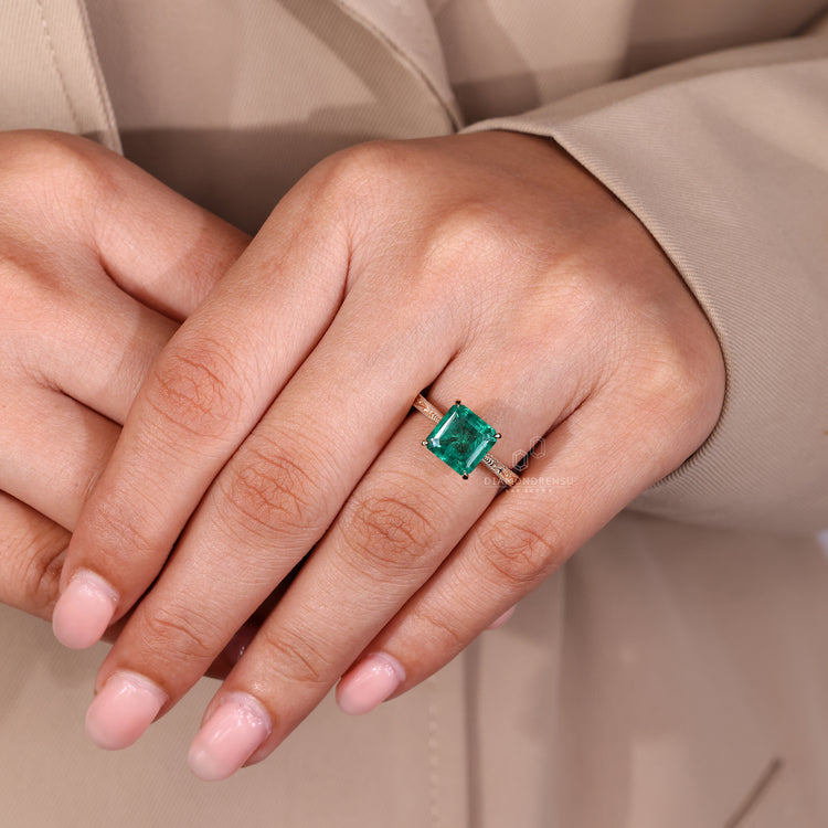 Asscher cut diamond ring in tapered shank design.