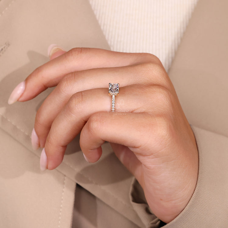 Handmade ring featuring a radiant cut diamond and a claw prong setting.