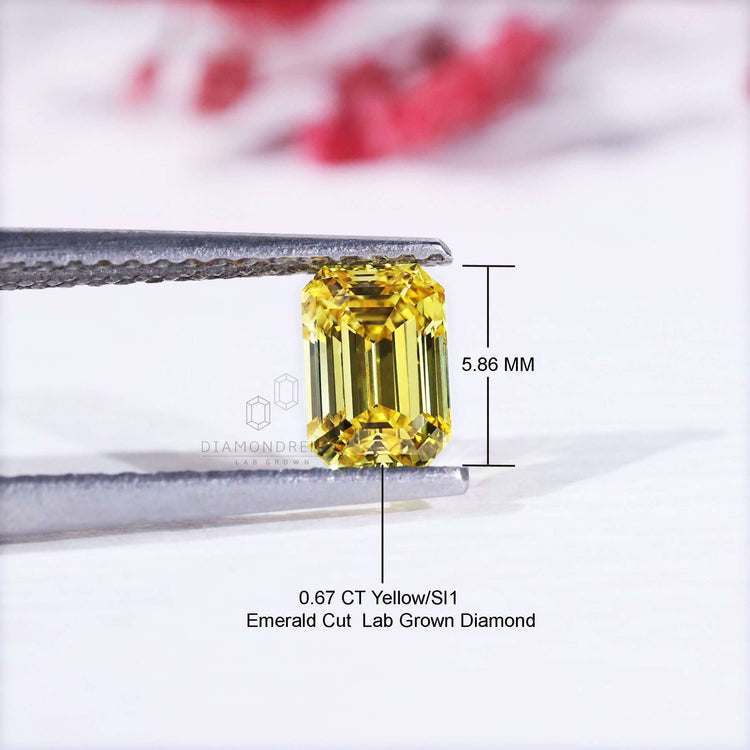 Lab grown diamond loose emerald cut yellow 0.70 ct.