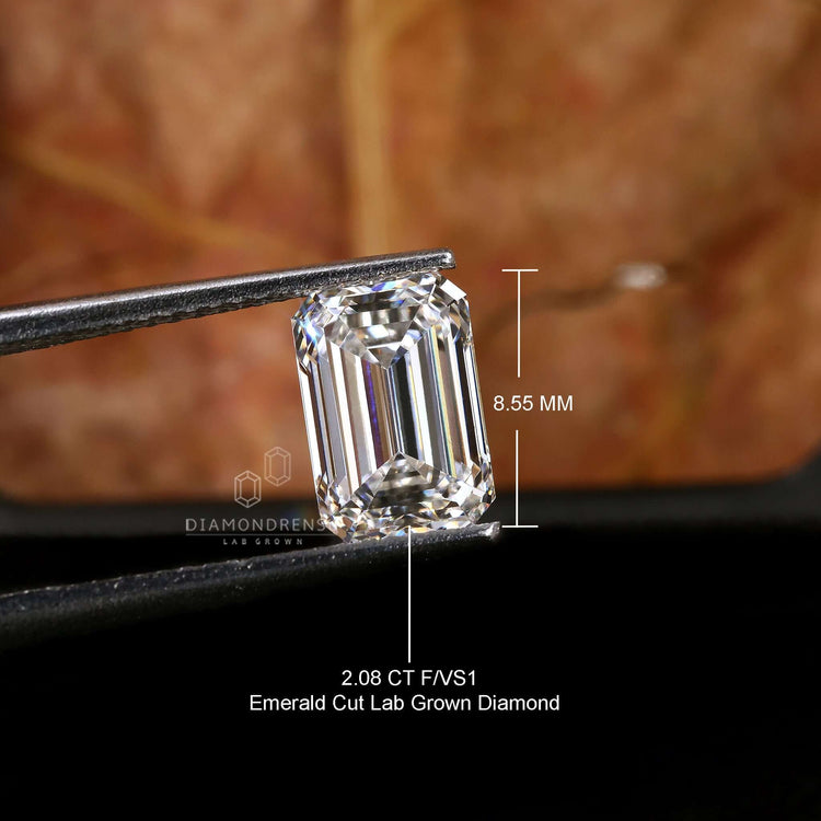 2 carat lab grown emerald cut diamond fits beautifully in solitaire rings.