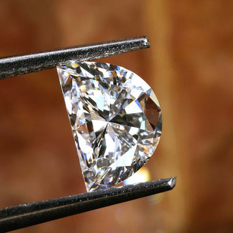 Half moon cut diamond with 1 carat weight.