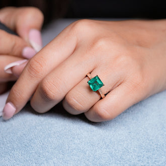 Buy custom asscher cut emerald engagement ring online.