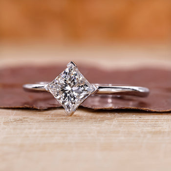 Princess cut engagement ring sparkles with modern brilliance.
