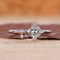 Compass prongs hold the diamond in perfect alignment.