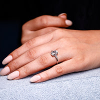 Bar setting ring pairs with a white gold diamond ring.