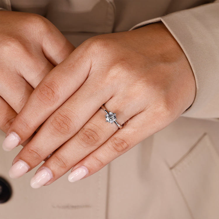 Six prong setting used to secure a round diamond, designed for durability and strength in handmade jewelry.