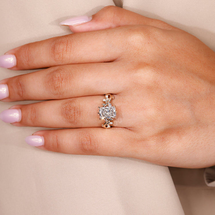 Cluster style engagement ring with radiant lab diamond and nature inspired look