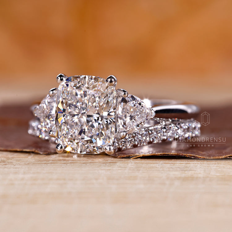 IGI certified cushion cut ring with a cathedral setting, handcrafted for your special day.