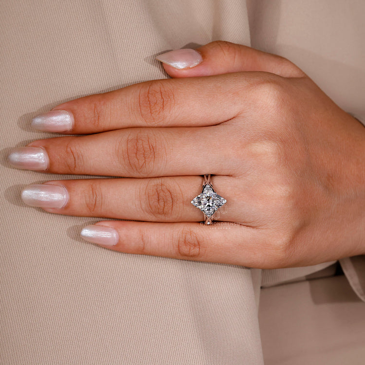 Round side stone ring paired with marquise cut engagement ring.