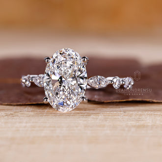 White gold ring with a flawless oval cut diamond for timeless appeal.