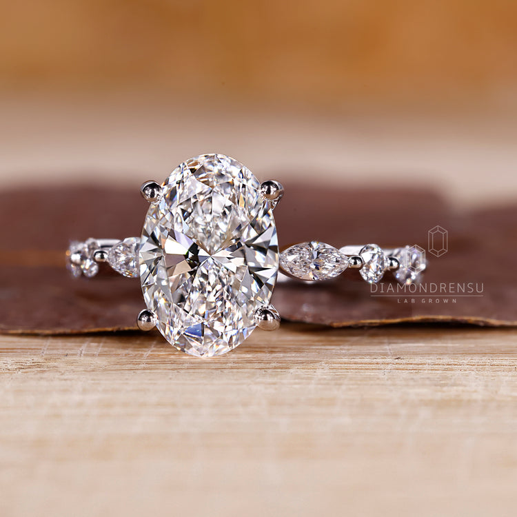 White gold ring with a flawless oval cut diamond for timeless appeal.