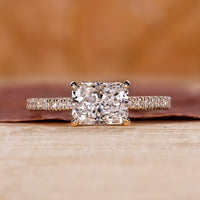 Radiant Cut Diamond Ring in a pave ring setting for a unique and stunning look.