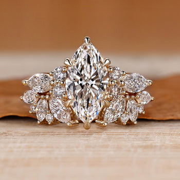 Marquise wedding ring with round and marquise side stones.