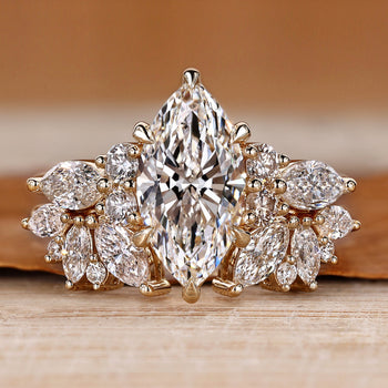 Marquise wedding ring with round and marquise side stones.
