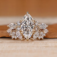 Marquise wedding ring with round and marquise side stones.