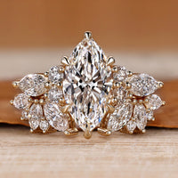 Marquise wedding ring with round and marquise side stones.