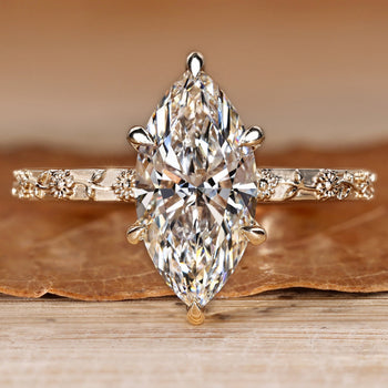Marquise solitaire diamond ring in Art Deco style.