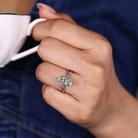 Lab grown marquise diamond ring with hidden halo style round diamonds.