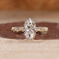 Marquise Diamond Ring with vintage inspired design and milgrain setting.