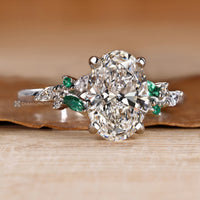 Oval engagement ring with a four prong setting.