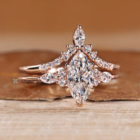 Muse setting highlights the marquise wedding ring.