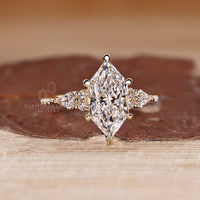 Marquise Diamond Engagement Ring with six claw prong and muse setting.