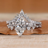 Lab grown diamond marquise ring with six claw prongs.