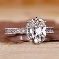 Old Mine Cushion Diamond Ring In Classic Solitaire Setting.