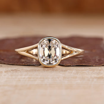 Old Mine Cushion Cut Diamond Ring in Bezel Setting