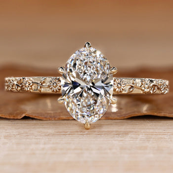 Nature inspired oval diamond ring.