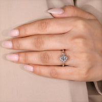 Lab grown diamond ring with oval centre and round accents.