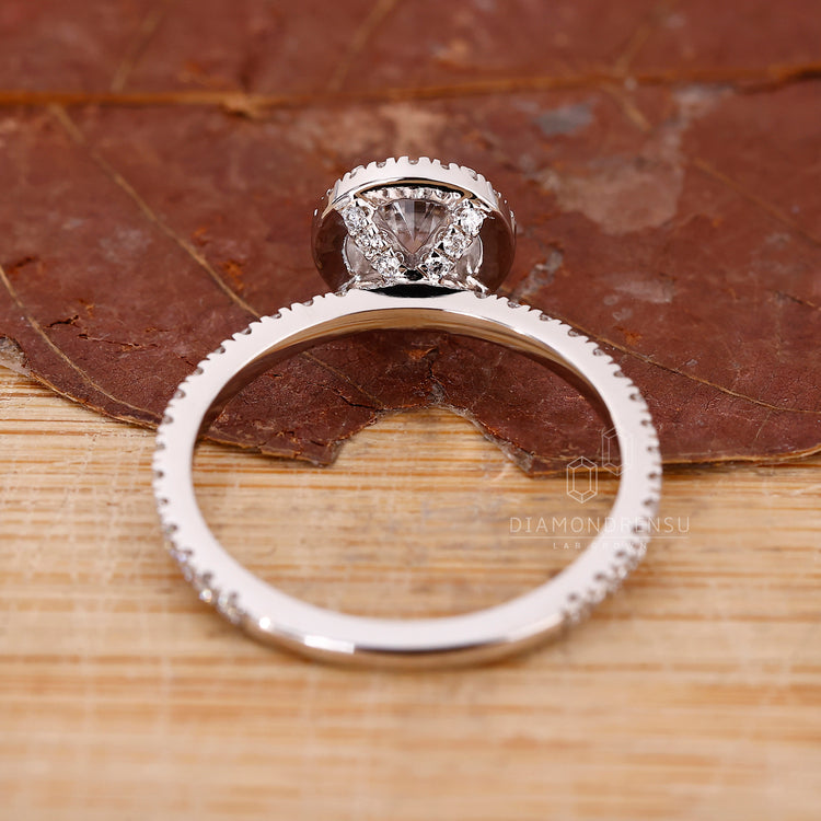 Custom engagement ring in white gold with four prong design.