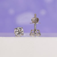 Sleek diamond stud earrings designed for versatile style.