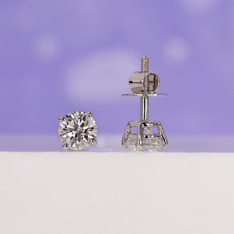 Sleek diamond stud earrings designed for versatile style.
