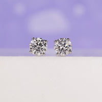 Stunning 1 carat diamond earrings for timeless elegance.