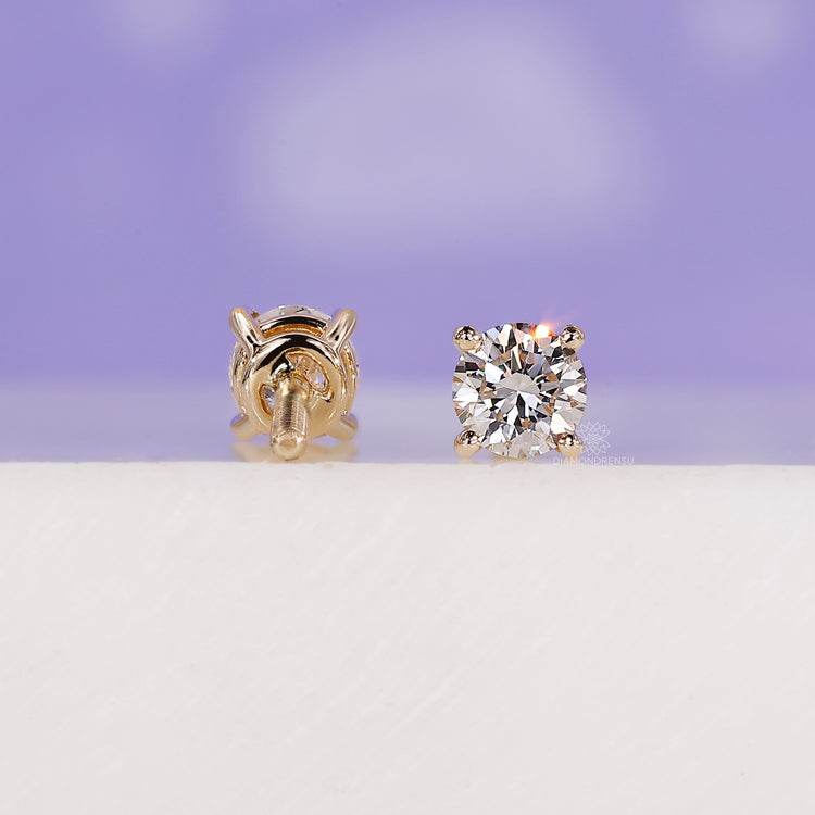 Prong setting earrings with lab grown diamonds for brilliance.