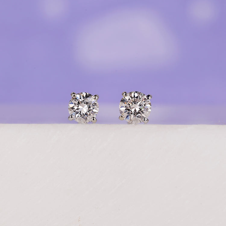 Elegant white gold earrings 0.18 TCW for a timeless look.