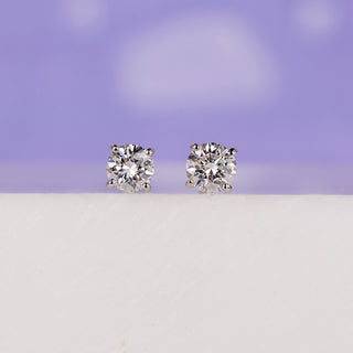 Elegant white gold earrings 0.18 TCW for a timeless look.