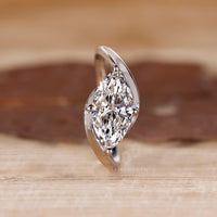 Lab grown marquise diamond engagement ring.