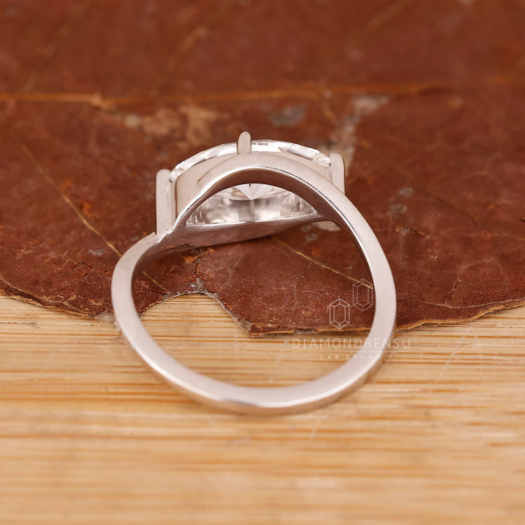 Proposal ring with East to West marquise stone.