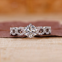 Round cut engagement ring with a sparkling lab grown diamond.