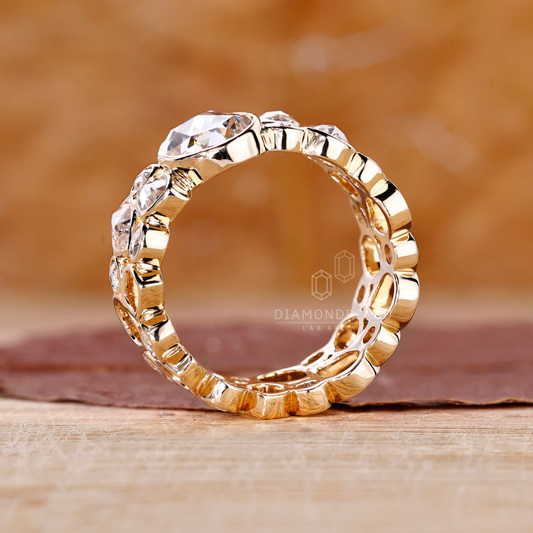 Cluster engagement ring with intricate diamond arrangement.